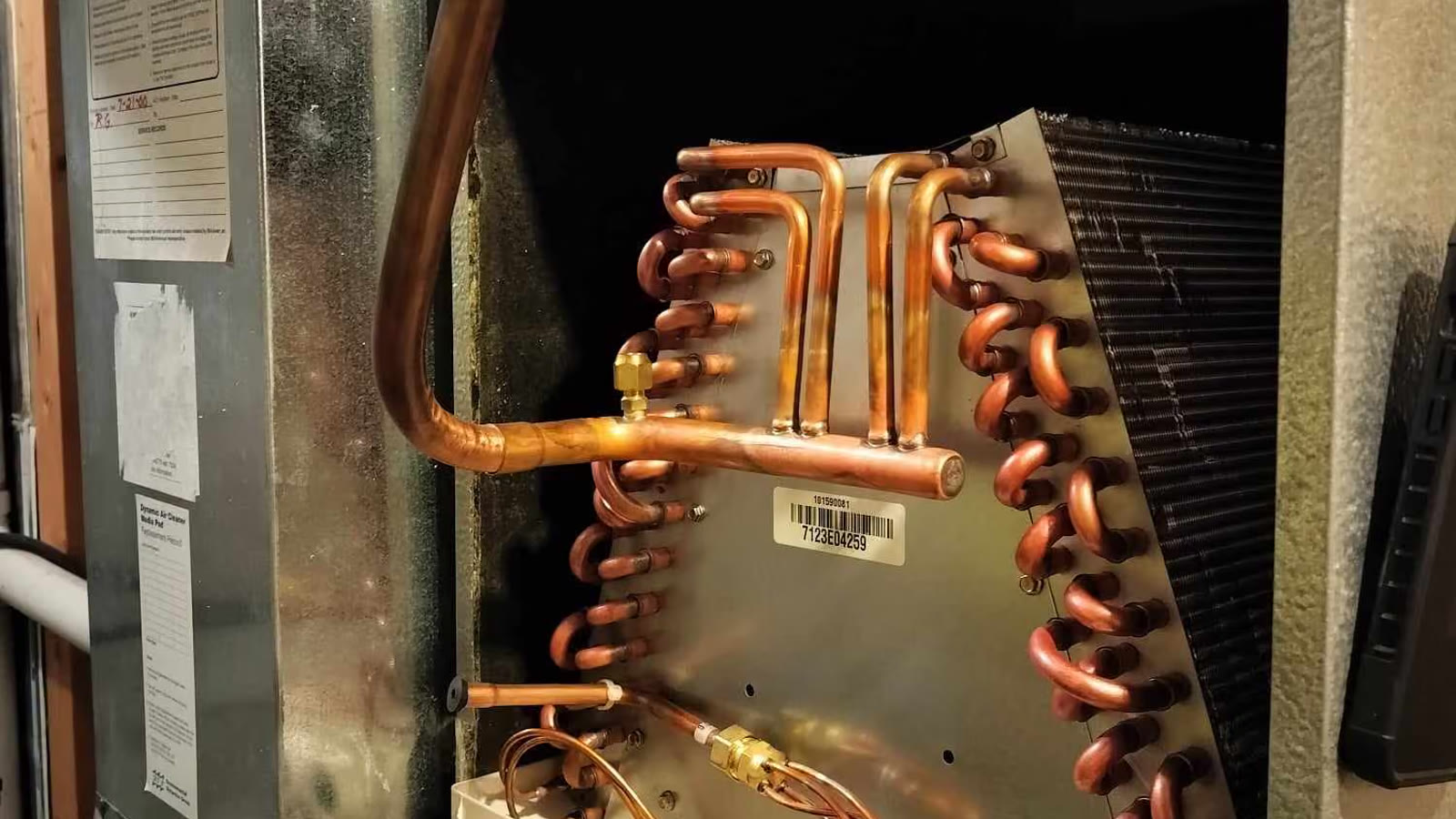 Exposed indoor HVAC evaporator coil during service